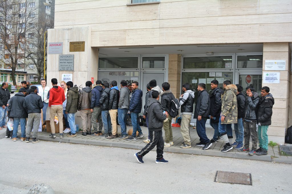 HELP TO MIGRANTS: DISTRIBUTION OF FOOD, CLOTHES AND SHOES IN TUZLA