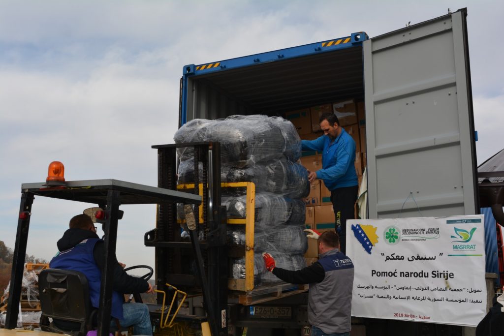 A shipping container of clothing and footwear set off for Syria today